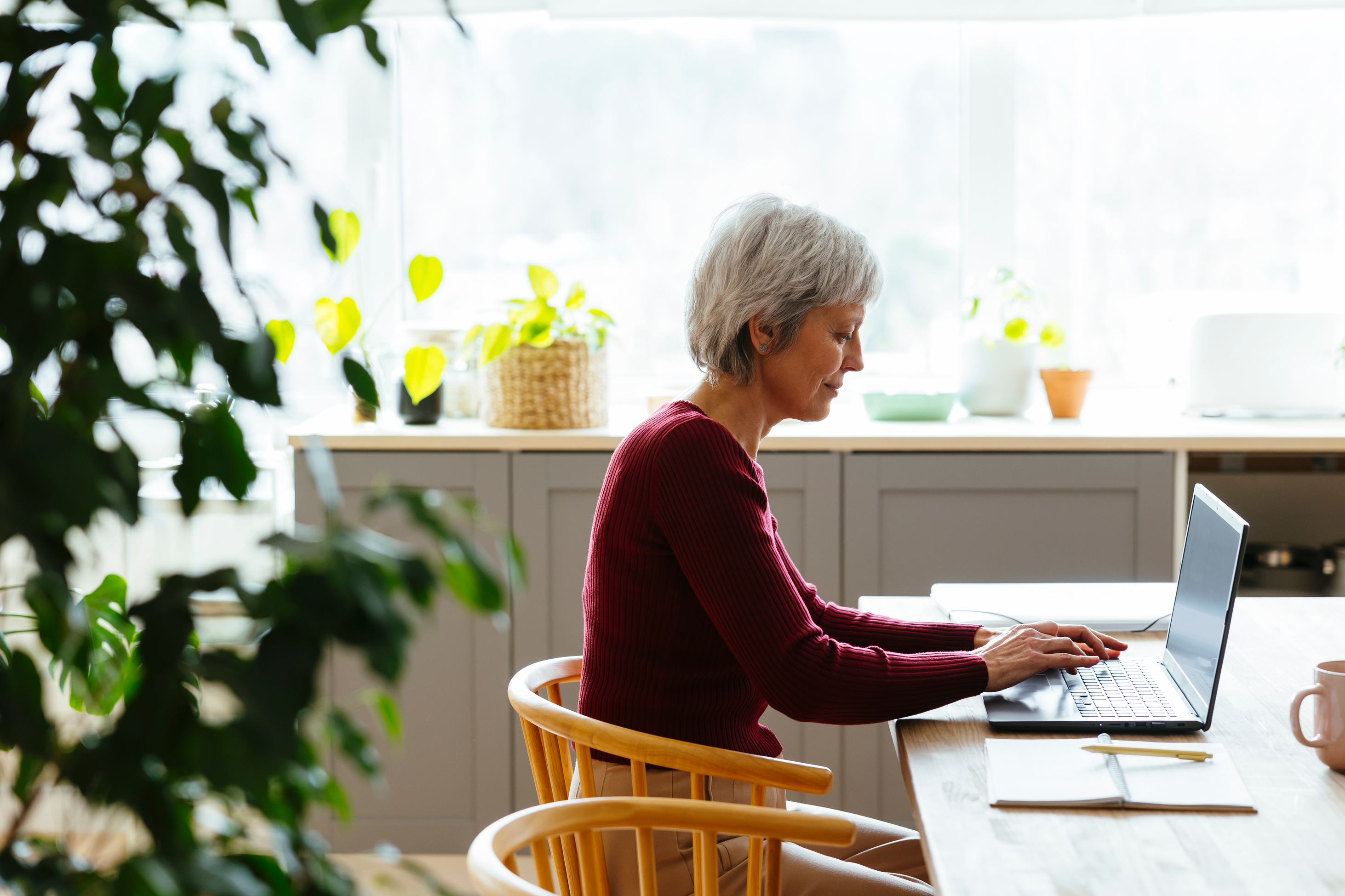 woman on laptop in a home office